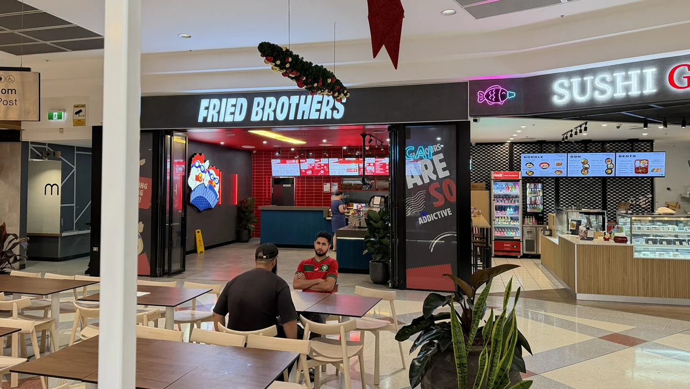Fried Brothers storefront in a food court
