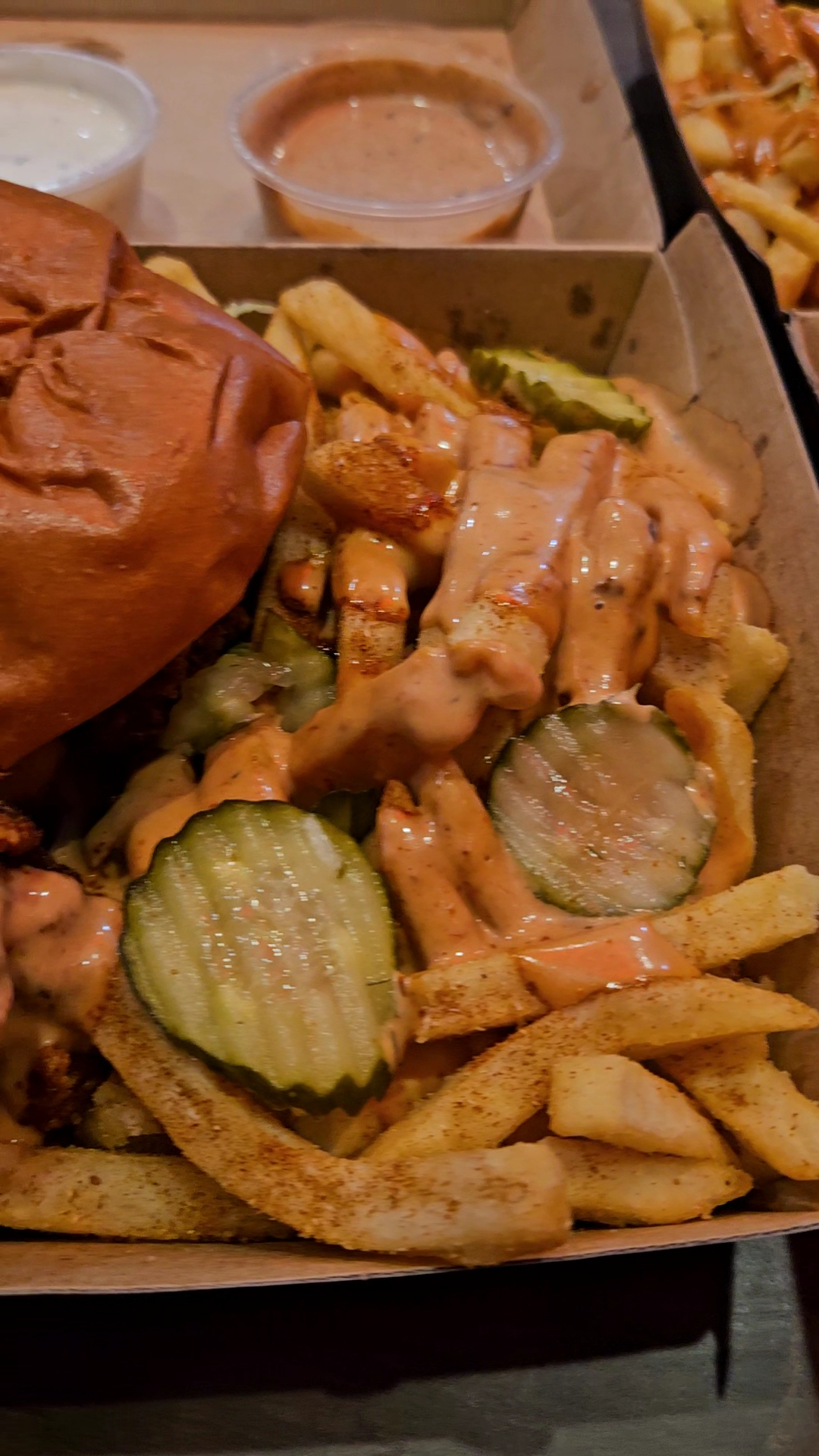 Fried Brothers fried chicken box with fries and pickles